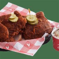 Half Bird · One breast quarter and one leg quarter fried to perfection and spiced your way, with two hom...