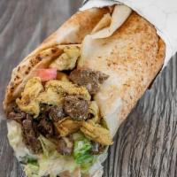 Mixed Shawarma · Chicken and Beef marinated with Arabic Spices, roasted and served in pita bread with Lettuce...