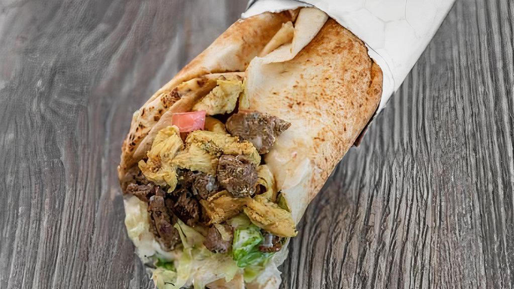 Mixed Shawarma · Chicken and Beef marinated with Arabic Spices, roasted and served in pita bread with Lettuce, Tomatoes, Onion, Garlic sauce and Tahine sauce
The best of both worlds!