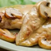 Chicken With Champiñones · Shredded chicken with mushrooms sauteed in garlic sauce, alfredo sauce, mozzarella and parme...