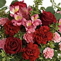 Blooming Belles Bouquet · The belle of the ball! Arranged in a ruby red vase, this romantic bouquet of rich red roses ...