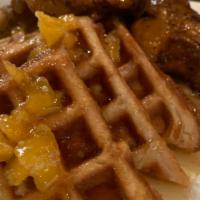 Chicken & Waffles · Marinated Chicken Breast Strips | Served with a Cinnamon Sugar Waffle.  Sample Cup of Taste ...