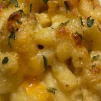 Baked Macaroni & Cheese · Elbow Noodles Tossed in a Three-Cheese  & Garlic Herb Blend.