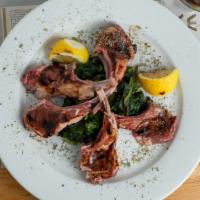 Lamb Chops · Three chops grilled with Greek herbs.