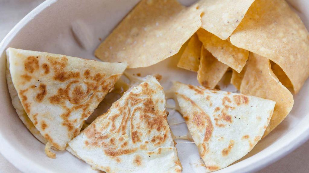 Kid'S Chicken Quesadilla · Chicken and cheese quesadilla. Served with tortilla chips, kid's beverage, and your choice of salsa or sour cream.