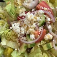 Greek Salad · Vegetarian. Lettuce, tomatoes, cucumbers, onions, kalamata olives, feta cheese, and pepperon...