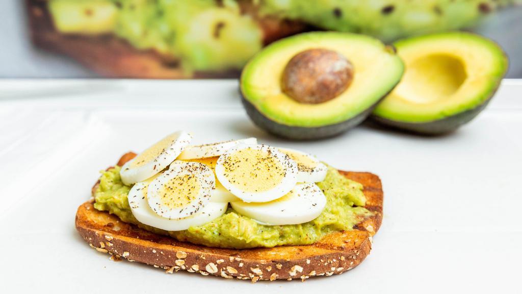 Protein Toast · Avocado paste, sliced eggs, black pepper, and olive oil.