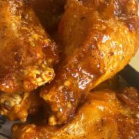Moochies Hot Wings 18Pc · Chicken drums and flats fried crispy and tossed in your choice of our house made sauce