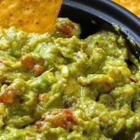 Chips And Guacamole · Utz tortilla chips with our house made guacamole