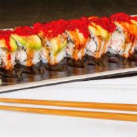 Umai Roll · Roll filled with crab salad and cucumber and topped with avocado and slices of eels and red ...
