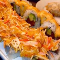 Lobster Tempura Roll · Roll filled with fried lobster and avocado topped with spicy mayo, crabstick, and crunch mix.
