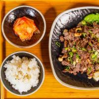 Bulgogi Dinner · Korean Marinated Beef. served with Rice and Kimchi.