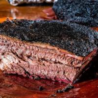 Beef Brisket 1/2 Pound · Seasoned to perfection with our house made BBQ dry rub, Slow smoked fresh daily over a blend...