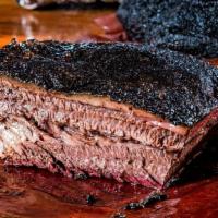 Beef Brisket Pound · Seasoned to perfection with our house made BBQ dry rub, Slow smoked fresh daily over a blend...