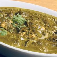 Palak Paneer · Indian cottage cheese cubes, spinach gravy, creamy sauce.