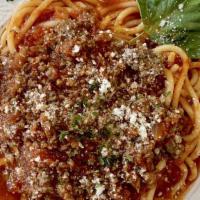 Spaghetti Meatsauce · With mozzarella cheese and oregano. Includes three garlic rolls.