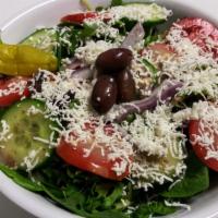 Greek Salad · Organic spring mix, cucumbers, red onions, tomatoes, pepperoncini, Kalamata olives, Feta che...
