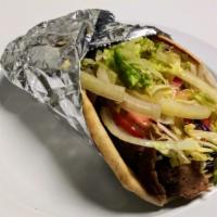 Gyro Wrap (Chicken) · Freshly sliced chicken from the rotisserie wrapped in pita bread with lettuce, red onions, t...