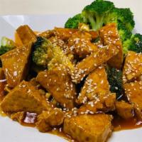 Sesame Tofu · Fried in sweet, tangy sauce topped w. sesame seeds.