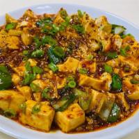 Mapo Tofu · Soft tofu w. ground pork & scallions.