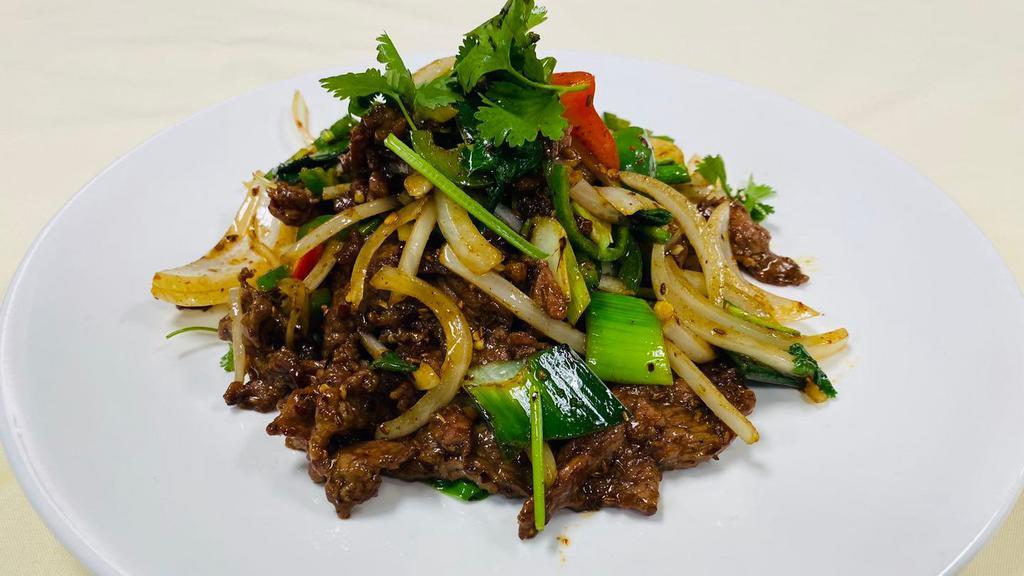 Cumin Beef · Finely sliced w. cumin ,onions, cilantro , red bell peppers, sesame seeds & jalapenos.
