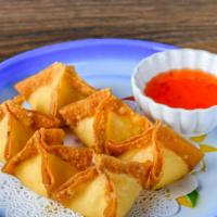 Crab Wonton · Crab mixed with onion and cream cheese, served with sweet dipping sauce.