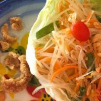 Som Tum · Shredded green papaya salad with, shredded of carrot, tomato, garlic, fresh chili, lime juic...