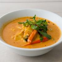 Red Curry · Thai famous curry. Aromatic red curry paste, coconut milk, bamboo, bell pepper, basil.