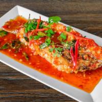 Chili Fish · Crispy fried whole red snapper in a sweet chili sauce.