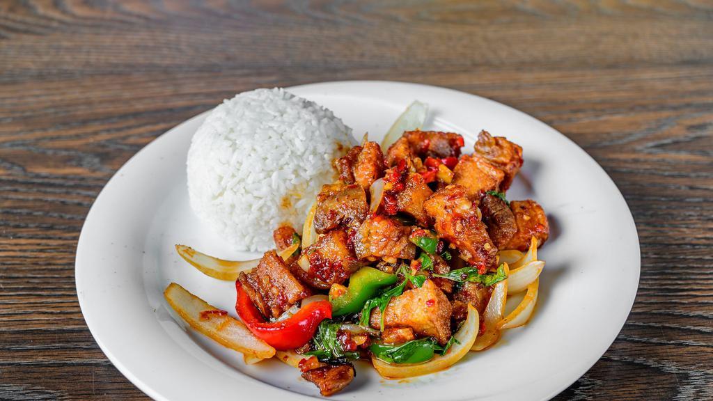 Pad Chicharrons Gra-Pao · Crispy pork belly sautéed with basil, fresh chili, bell pepper and garlic over with rice.