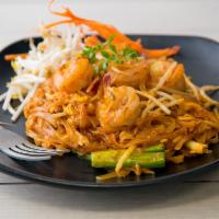 Pad Thai · Thailand’s national dish. Stir-fried rice noodles, egg, peanut, scallions, and bean sprouts.