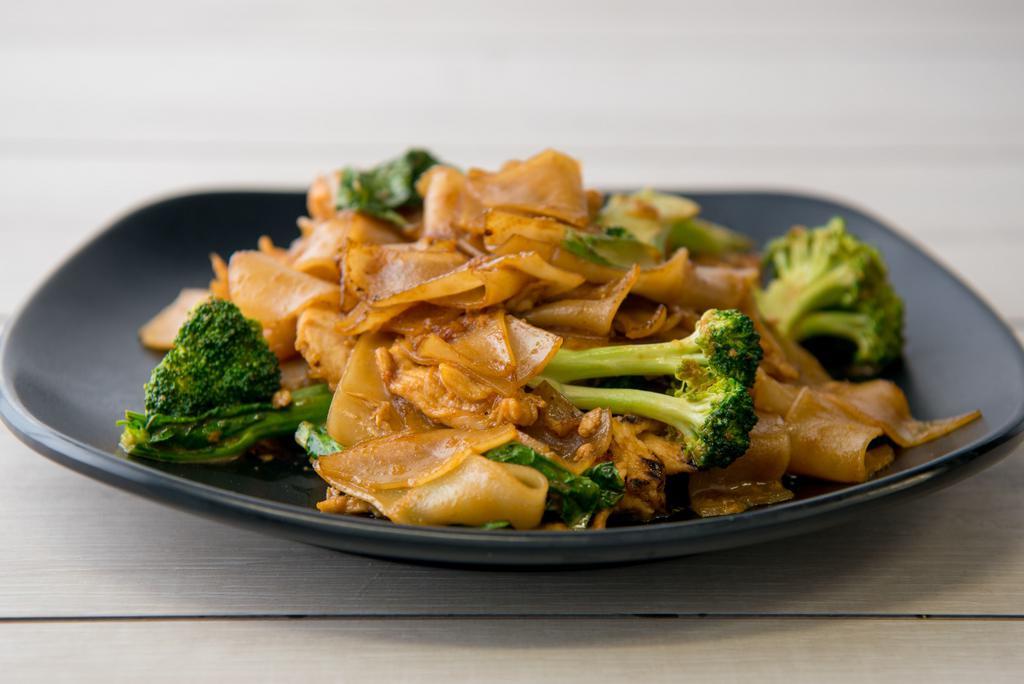 Pad See Eew · Fresh flat rice noodles sauteed with chinese broccoli and seasoned with sweet soy sauce.