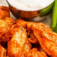 Traditional Wings (10 Pcs.) · Served with celery and carrots