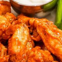 Traditional Wings (15 Pcs.) · Served with celery and carrots