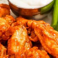 Traditional Wings (30 Pcs.) · Served with celery and carrots
