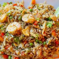 Shrimp Fried Rice · A generous amount of fried shrimp with the chef's choice of mixed vegetables.