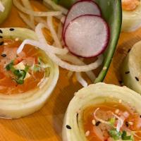 King Salmon K.C. Roll · Salmon, scallion, imitation crab with cucumber wrap, & sesame seeds. Extra: Cream cheese for...