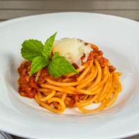 Bucatino Amatriciana · Tomato sauce, red onion, guanciale, basil, and Pecorino cheese.