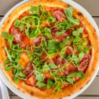 Pizza Ruculosa · Tomato sauce, mozzarella, prosciutto di Parma and arugula.