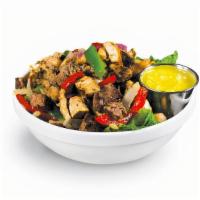 Steak & Chicken Bowl · Steak and chicken sautéed with bell peppers, onions, and our special seasoning. Includes a s...