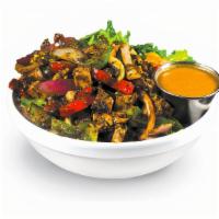 Jerk Chicken Bowl · Jerk Chicken sautéed with bell peppers, onions, and our special seasoning. Includes a sauce.