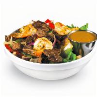 Shrimp & Steak Bowl · Shrimp and steak sautéed with bell peppers, onions, and our special seasoning. Includes a sa...