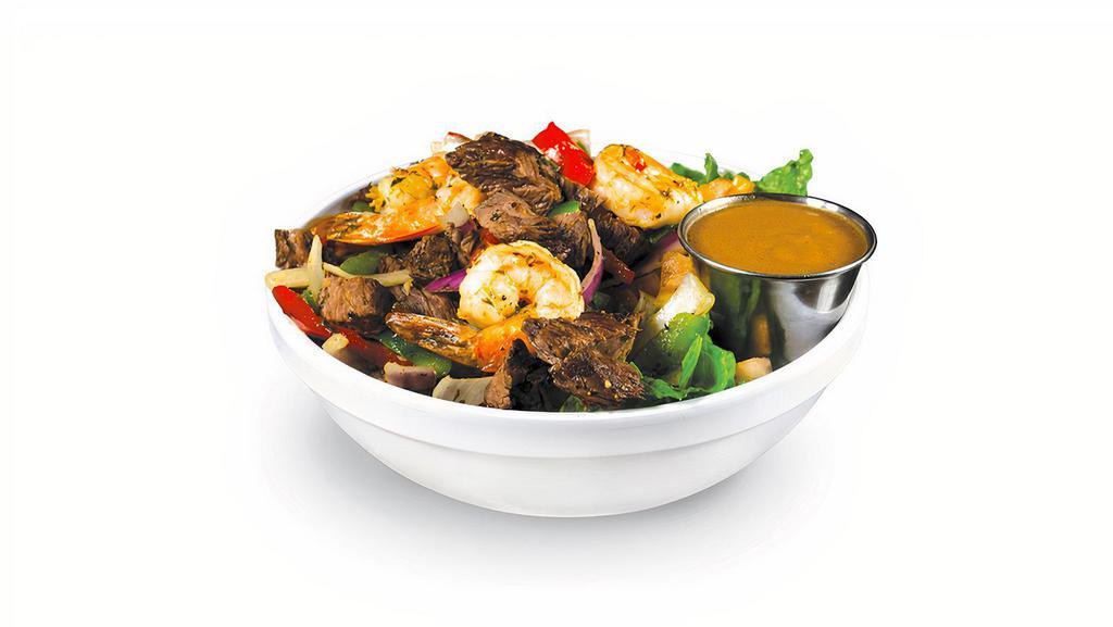 Shrimp & Steak Bowl · Shrimp and steak sautéed with bell peppers, onions, and our special seasoning. Includes a sauce.
