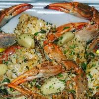 Garlic Blue Crabs À La Carte · 1 1/2 lbs of fresh cleaned seasoned cooked blue crabs coated with flavor of your choice;  Ga...