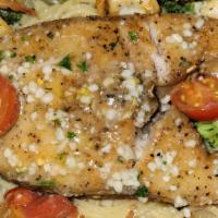 Red Snapper Over Spaghetti · Fresh steak cut of red snapper pan seared served over a bed of spaghetti tossed with roasted...