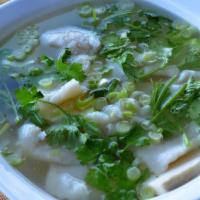Fish And Tofu Soup · Fish filets,bean curd and cilantro;served in our broth.Made fresh to order for six servings.