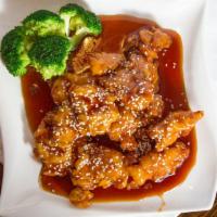 Sesame Chicken · Lightly fried in our sesame sauce and fresh broccoli on the side.