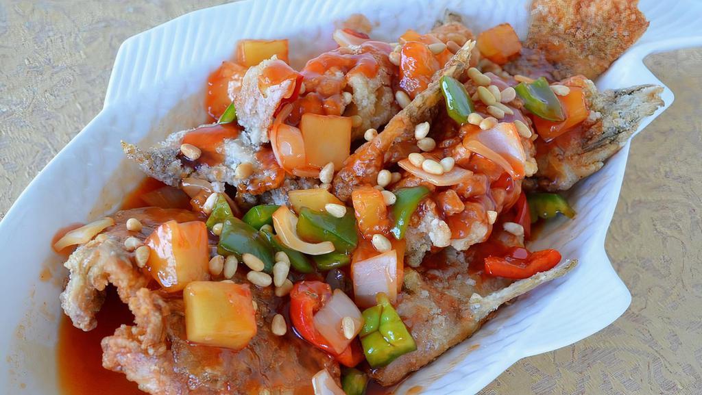 Sweet And Sour Crispy Tilapia · Live tilapia (whole) deep-fried and served with our sweet and sour sauce.