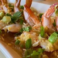 Steamed Garlic Shrimp · Marinated with garlic and steamed on a bed of rice noodles.