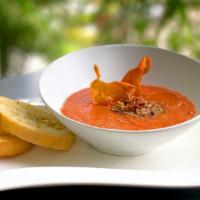 Creamy Concasse Tomato · Vine-ripened roma tomatoes concasse pureed with fresh cream and blue cheese for a comforting...